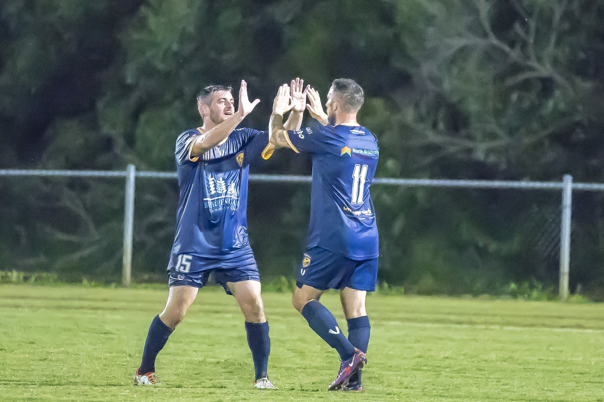 The Narangba Eagles celebrate one of their five goals in their victory against Tweed United. Photo credit Yvonne PackbierMMM Photography.