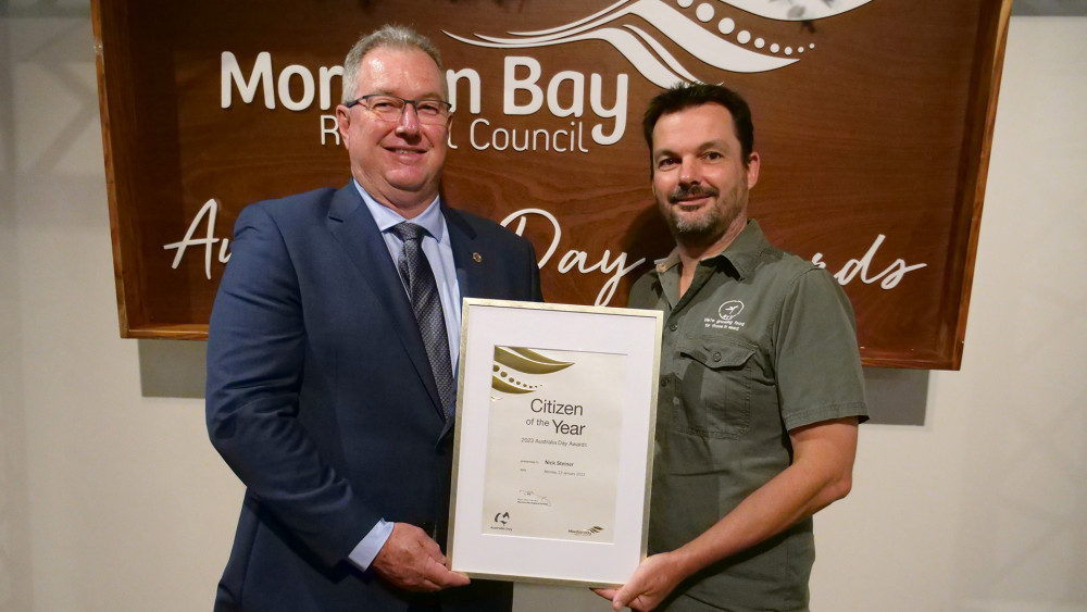 Nick Steiner was this year’s winner of the MBRC Citizen of the Year Award. Pictured: Mayor Peter Flannery and Nick Steiner.