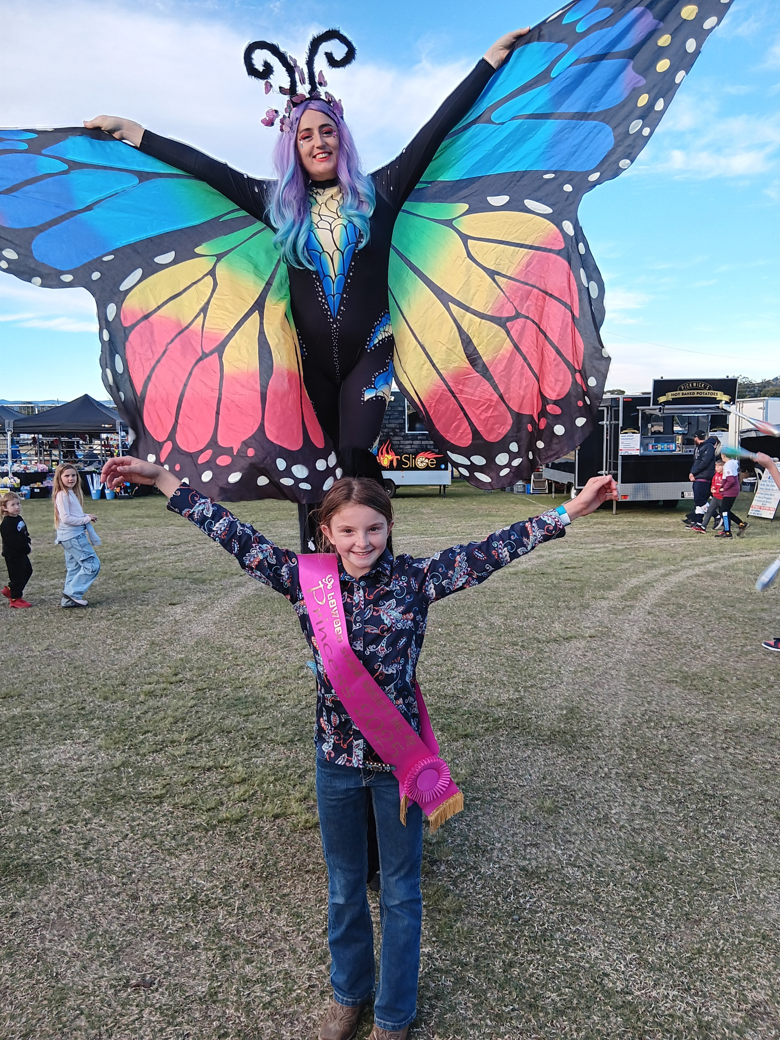 Stilt walker Kiera with Zoe Lewis
