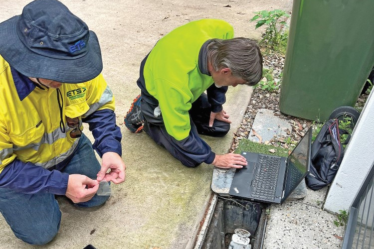 Unitywater crew members checking smart water meters